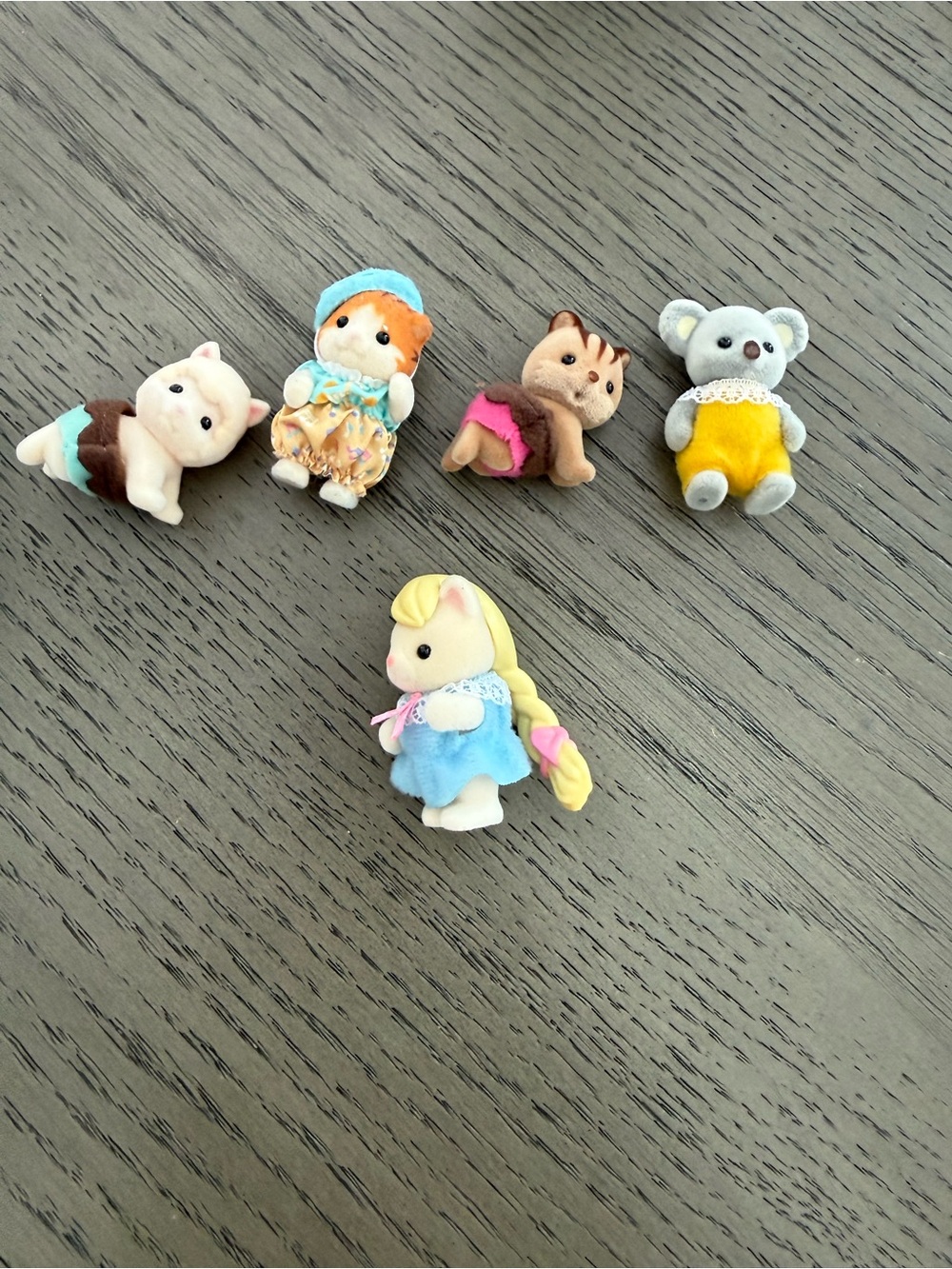 Assorted Calico Critters and furniture